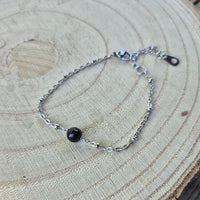 Nott - Bracelet fin une Perle de Tourmaline Noire