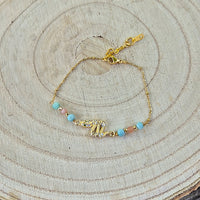 Yemaya - Bracelet fin Amazonite et Pierre de Soleil Serpent