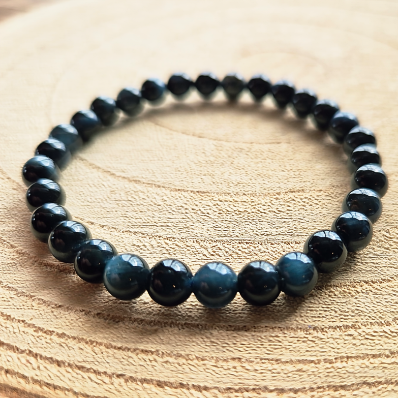 Bracelet en œil de faucon naturel perles 6 mm, bracelet utilisé en lithothérapie pour la clarté et le discernement.