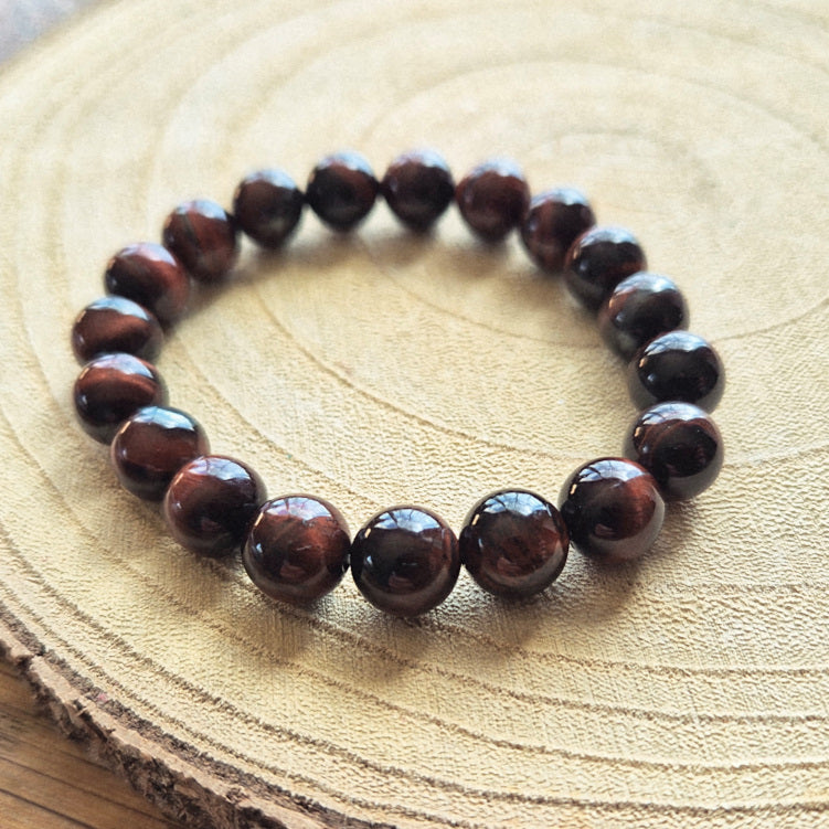 Bracelet en œil de taureau naturel avec perles de 10 mm aux reflets brun rouge montées sur élastique