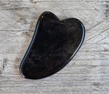 Gua sha en obsidienne noire